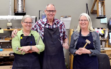 master goldsmiths in the jewelry workshop