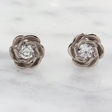 Medium White Gold Rose Stud Earrings With Diamonds - top view