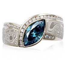 Mokume Wave Diamond Crossing Engagement Ring with blue diamond - top view