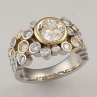 scattered bezel two tone engagement ring