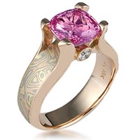 Pink sapphire and rose gold engagement ring