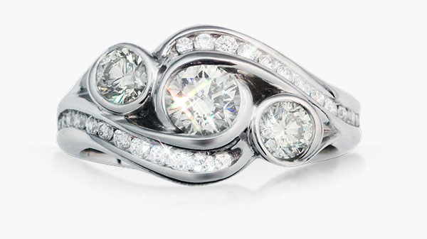 three stone swirl engagement ring